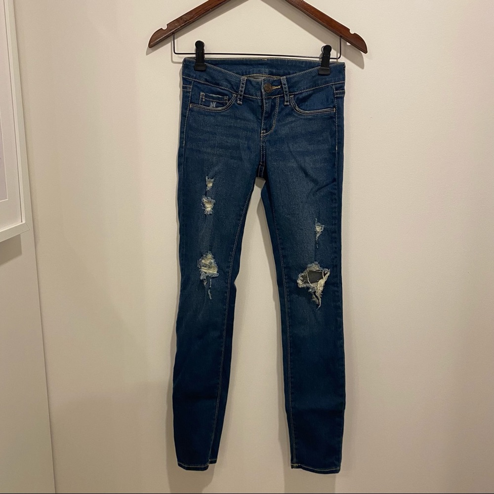 Dark blue low rise skinny jeans